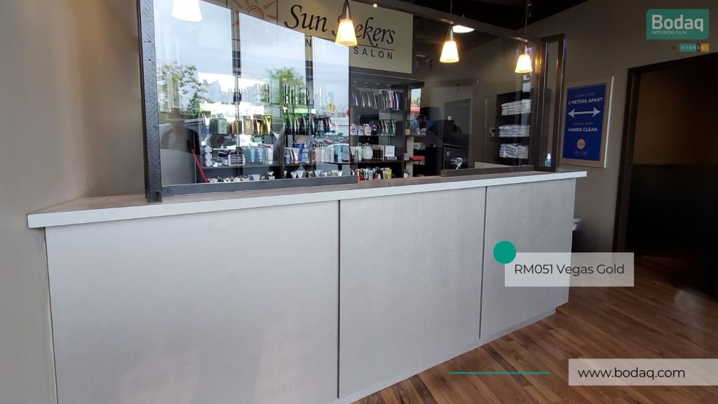 RM051 Vegas Gold Interior Film - Metal Collection 8 Reception Desk at Sunseekers Salon refinished with RM051