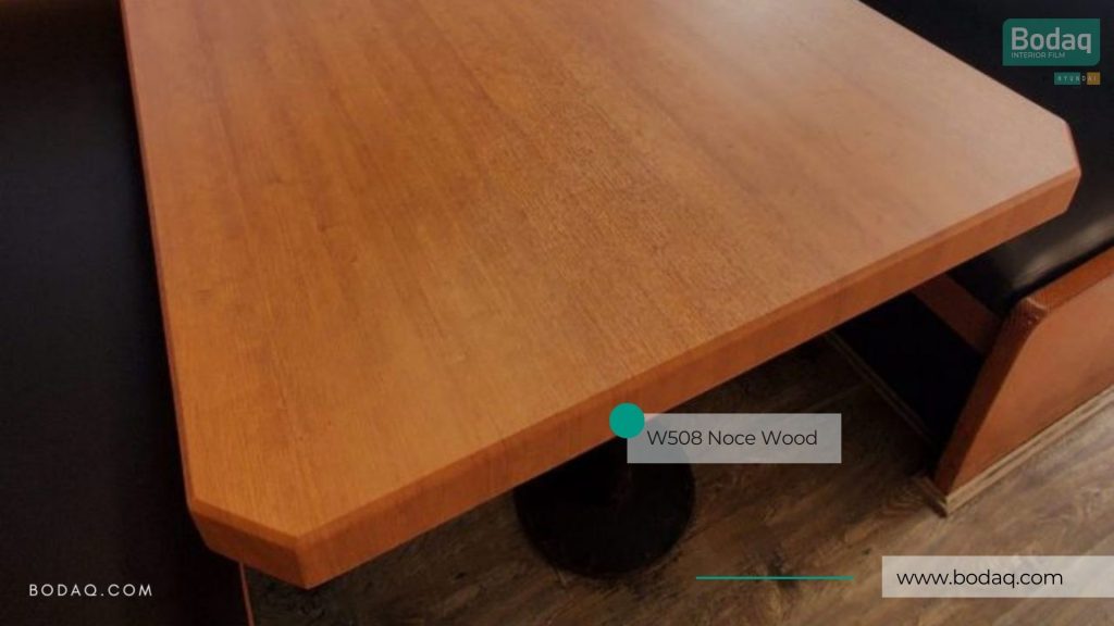 W508 Noce Medium Wood Interior Film - Standard Wood Collection 6 Resurfaced restaurant table closeup
