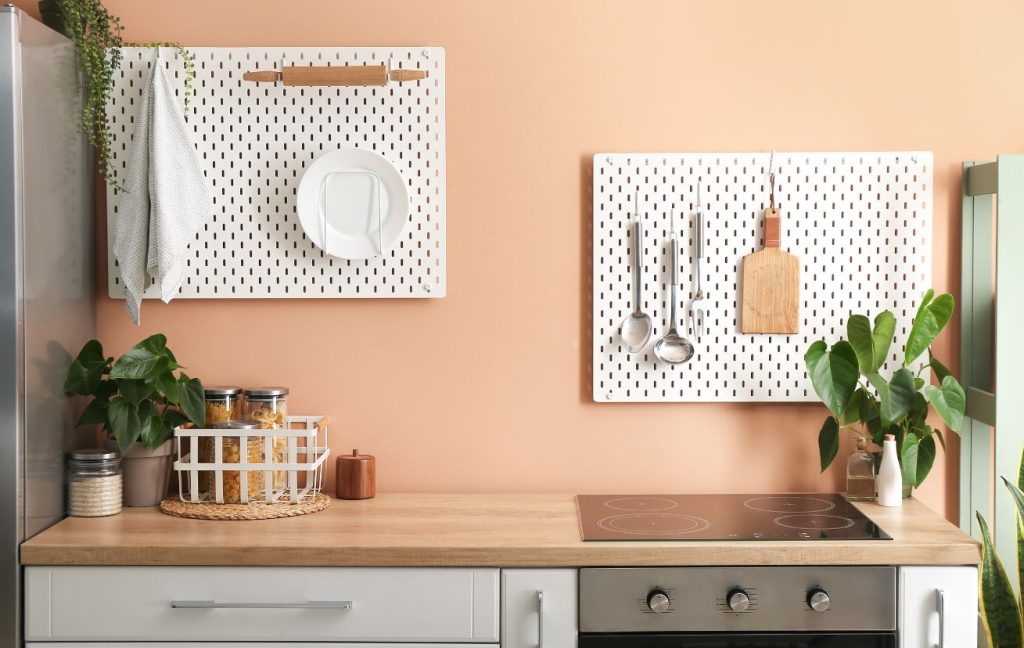 Use a pegboard to maximize storage space