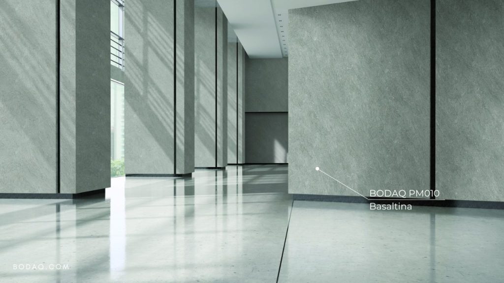 PM010 Basaltina used to refinish lobby wall panels without structural changes to the hotel lobby.